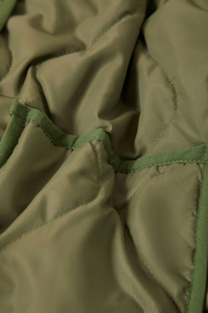 Women's Delilah Quilted Jacket in the color Olive Surplus - Additional Laydown image