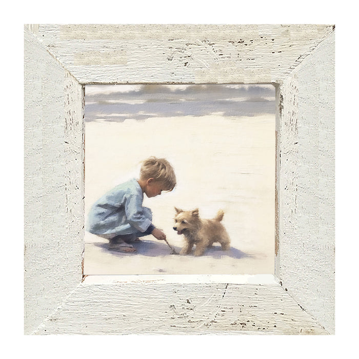 Boy with dog on beach - Framed art
