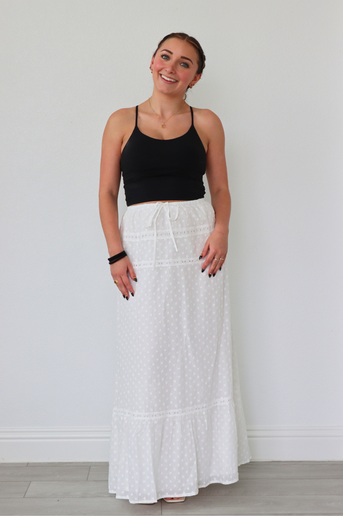 girl wearing white long skirt
