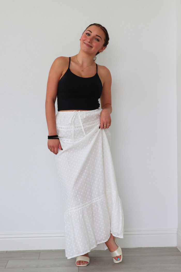 girl wearing white long skirt