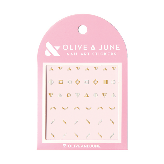 Foil Accent Pack with metallic gold and silver geometric nail art stickers on pink packaging from Olive and June