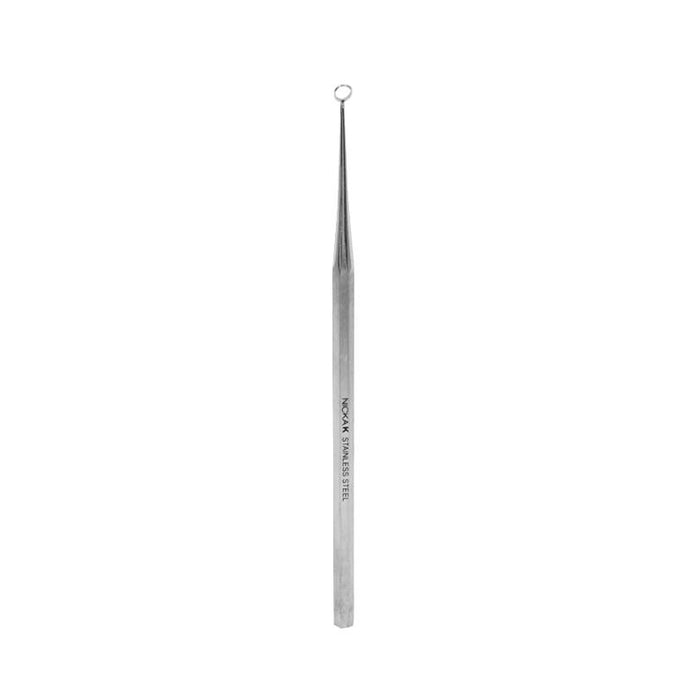 NICKA K stainless steel blackhead extractor with slim hex handle and small loop tip for precise pore extraction