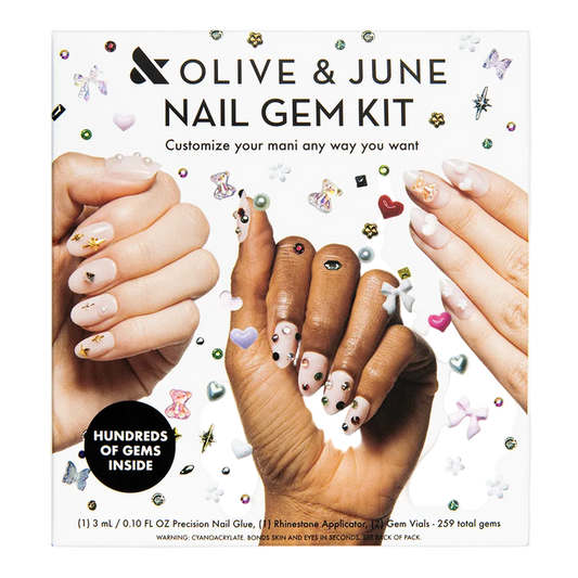 Olive & June nail gem kit packaging with hands showing decorated nails.