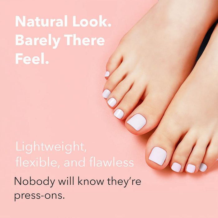 EBIN white chrome press on toenails on model feet against pink background showing natural look